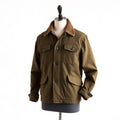Waxed olive barn jacket with corduroy collar